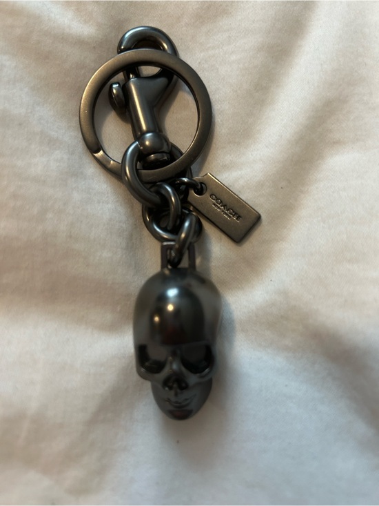 Coach Accessories - Reserved msmith9790
Black Skull Keychain Charm